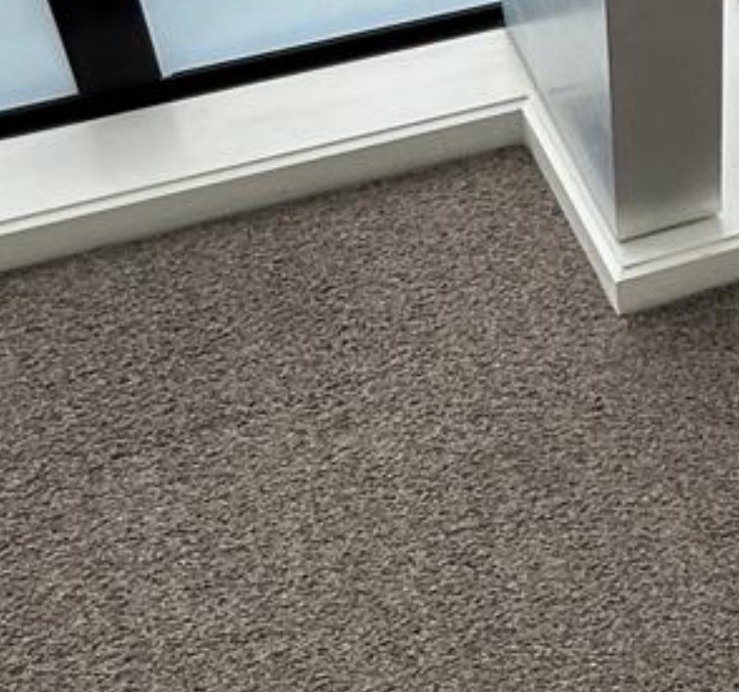 photo of grey carpet cleaned in commercial environment
