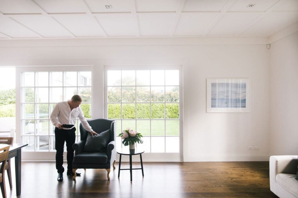 Man inspecting recently cleaned fabric seat from upholstery cleaning