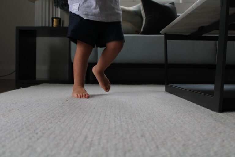 kids leg on carpet close up