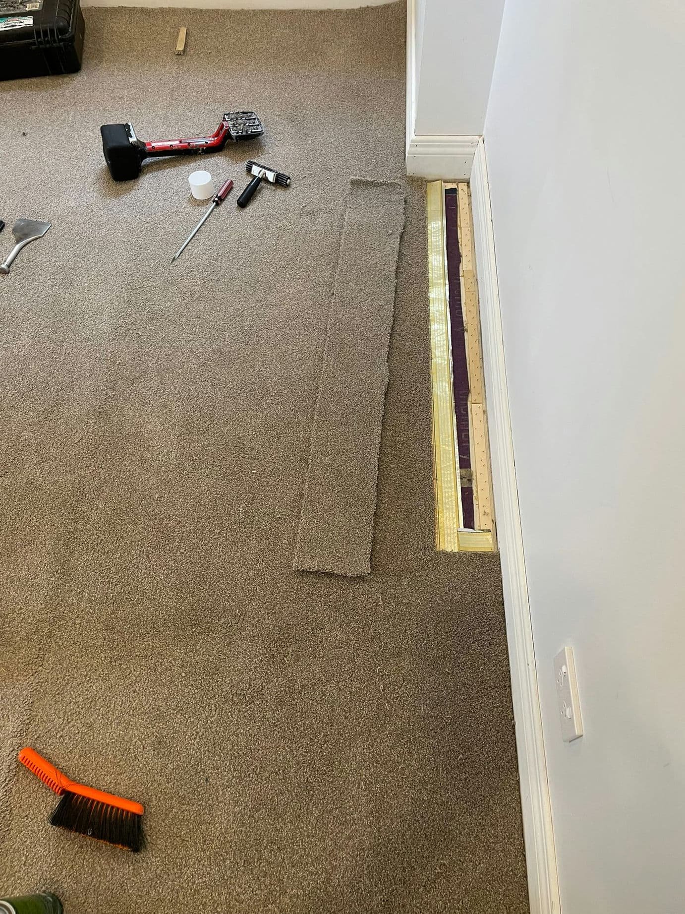 Carpet Repairs 10 1Carpet Repair against wall Before1
