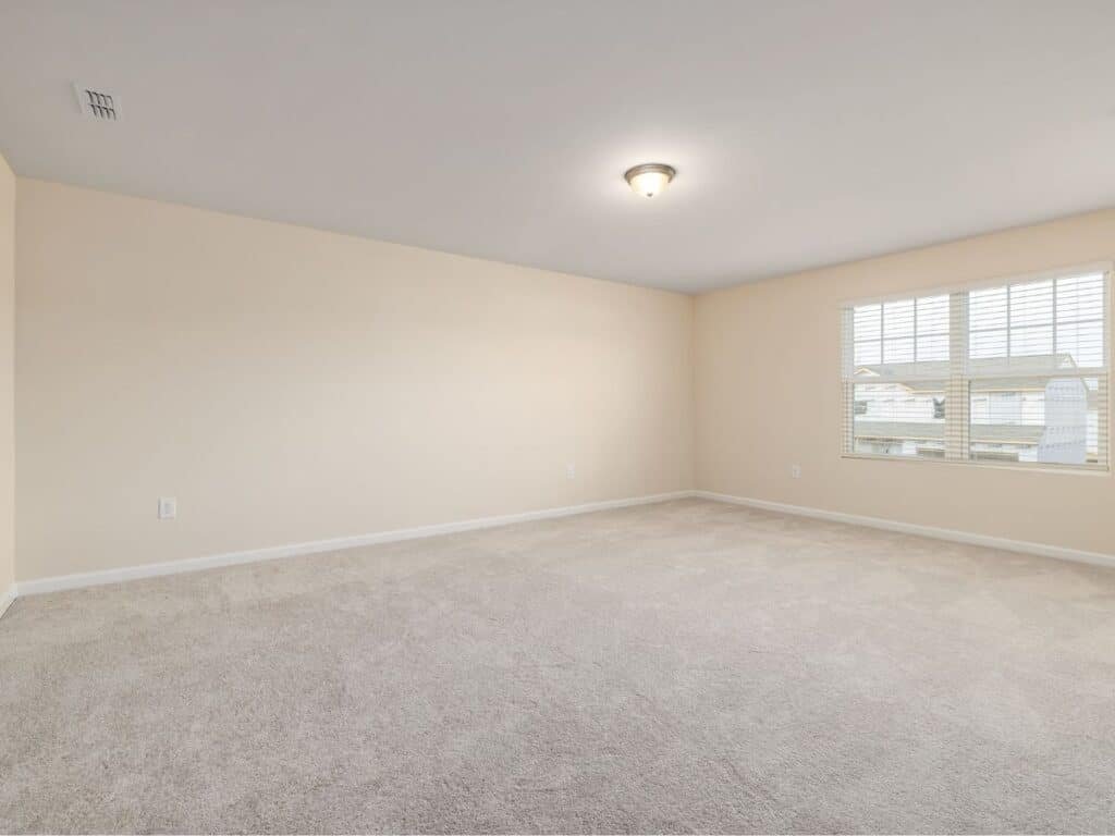 carpeted room in rental property