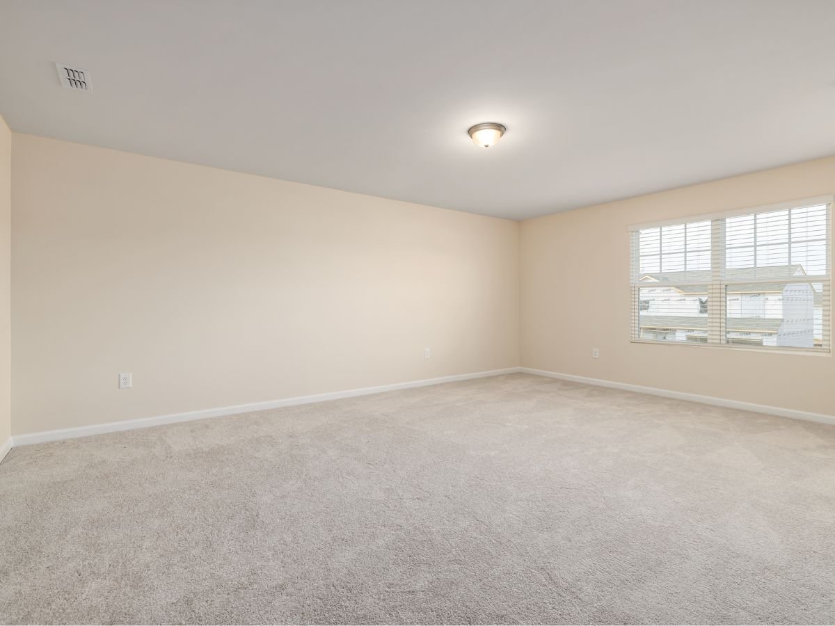 carpeted room in rental property